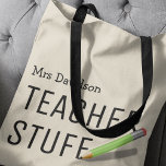 Teacher Stuff Bag | Personalised Gift<br><div class="desc">Every student has their favourite teacher/teaching assitant. This cool personalised tote bag is the perfect gift to show your appreciation for all their hard work over the school year,  with the text "TEACHER STUFF",  a pencil and personalised with the teachers name.</div>