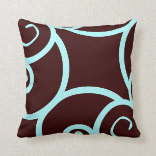 teal and brown abstract pattern pillow
