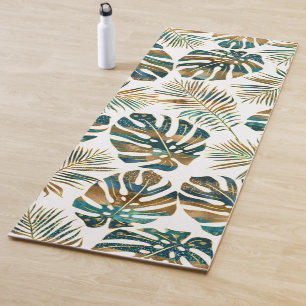 Teal and gold patterned tropical leaves yoga mat