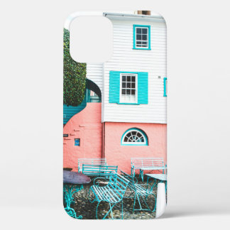 TEAL AND GRAY TABLE AND BENCH BESIDE WHITE AND ORA iPhone 12 CASE