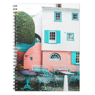 TEAL AND GRAY TABLE AND BENCH BESIDE WHITE AND ORA NOTEBOOK