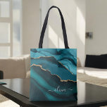 Teal Aqua Blue Green Agate Geode Gold Monogram Tote Bag<br><div class="desc">Teal Aqua Blue Green and Gold Foil Agate Geode Monogram Beautiful Elegant Script Name Book Bag. This makes the perfect sweet 16, 13th, 15th, 16th, 18th, 21st, 30th, 40th, 50th, 60th, 70th, 80th, 90th, 100th birthday, wedding, bridal shower, anniversary, baby shower, graduation or bachelorette party gift for someone decorating her...</div>
