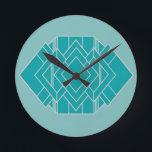 Teal Art Deco Quilt Inspired  Round Clock<br><div class="desc">This clock,  has an art deco quilt-inspired design of diamond shapes and a rectangle,  both in teal and silver,  on a field of lighter teal.</div>