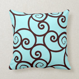 teal background and brown abstract pattern pillow