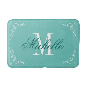 Teal blue bath mat with elegant name monogram