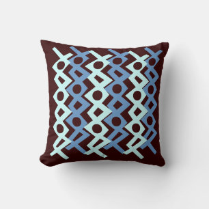 teal blue pattern on brown pillow