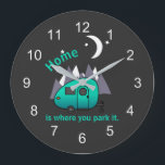 Teal Blue Teardrop Camper Trailer Wall Clock<br><div class="desc">Camper theme wall clock with inspirational slogan "Home is where you park it", which can be edited to your own words. Printed with an image of a teal coloured teardrop style travel trailer against grey abstract mountains. moon and stars. Your choice of round or square. See more trailer themed designs...</div>