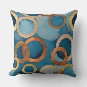 teal-blue with gold and muted-copper rings cushion