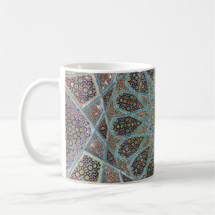 Teal, brown, and yellow floral kaleido artwork coffee mug