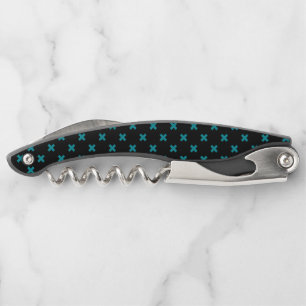 Teal cross stitches on black corkscrew