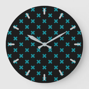 Teal cross stitches on black large clock