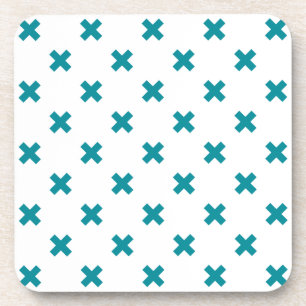 Teal cross stitches on white coaster