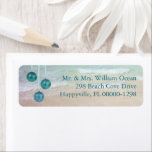 Teal Ocean Tropical Christmas Return Address Return Address Label<br><div class="desc">Return address labels with a tropical Christmas theme.  Ocean water and beach sand background image with hanging ball ornaments in pretty teal colour.  Printed text is aligned to the right.  Print three or four name and address lines.  Remove the ornaments if needed.</div>