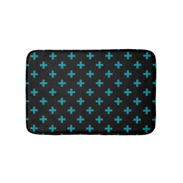 Teal polka crosses on black bath mat (Front)