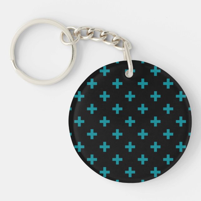 Teal polka crosses on black key ring (Front)