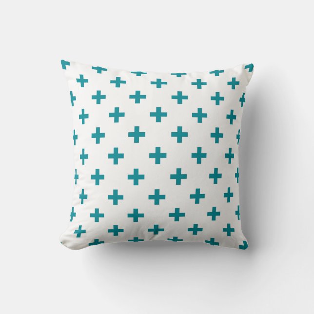Teal polka crosses on white cushion (Front)