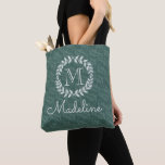Teal & Sage Greenery Botanical Wreath Monogrammed Tote Bag<br><div class="desc">Carry your things in style with this personalised green and white monogrammed tote bag.Name and initial can be different on front and back. All text is simple to customise. Design features modern laurel wreath and leaves, stylish typography initial, and hand written style script calligraphy name. Makes an elegant and useful...</div>