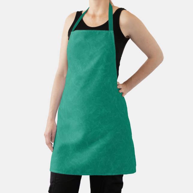 Teal textured surface with subtle swirling pattern apron (Insitu)