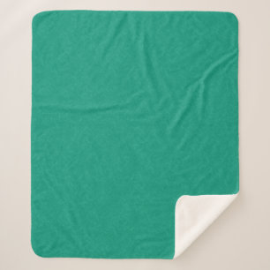 Teal textured surface with subtle swirling pattern sherpa blanket