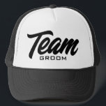 Team Groom script typography wedding party Trucker Hat<br><div class="desc">Team Groom script typography wedding party Trucker Hat. Custom black and white baseball cap for groom and groomsmen. Stylish hand lettering design for bachelor party games and more. Available in other cool colours too. Create them for your group of friends, guests, squad, crew, best man etc. Also available for bridal...</div>