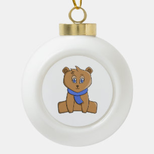 Teddy bear wearing a blue scarf ceramic ball christmas ornament