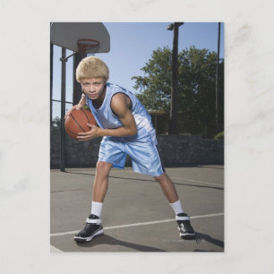Teenage boy on basketball court 2 postcard