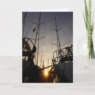 Tegenlicht bij 2 zeilboten in de haven. card
