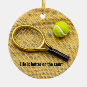 Tennis ball and racket on brown life is better ceramic ornament