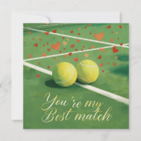 Tennis ball with  LOVE on blue court