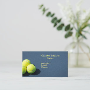 Tennis balls are on the court background business  card