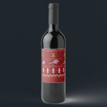 Tennis Christmas Sweater Knitted Pattern Red Xmas  Wine Label<br><div class="desc">Warm and cosy winter days and nights illustration design, featuring classic knitted funny ugly Christmas sweater with tennis rackets and green tennis balls, jingle bells, fir trees, and snowflakes. Minimalistic Xmas sweater pattern festive design in light blue and white for tennis players. Tennis Christmas pattern sweater. Tennis Xmas design. Scandi...</div>