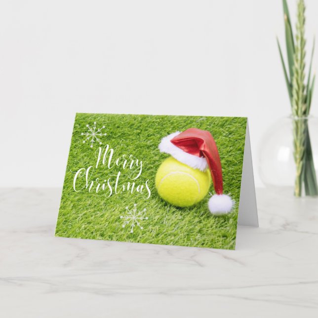 Tennis Christmas with tennis ball and Santa hat Holiday Card (Front)