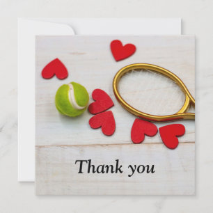 Tennis racket and ball with love red heart