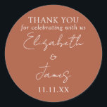Terracotta Elegant Script Wedding Thank You Classic Round Sticker<br><div class="desc">This terracotta minimalist elegant script wedding thank you sticker can be personalised with your information in chic typography. Designed by Thisisnotme©</div>