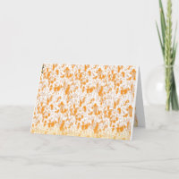Textile pattern featuring a vibrant orange and gol
