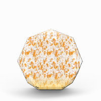 Textile pattern featuring a vibrant orange and gol
