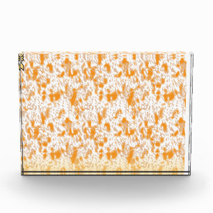 Textile pattern featuring a vibrant orange and gol photo block
