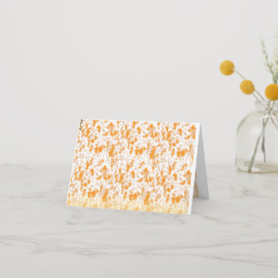 Textile pattern featuring a vibrant orange and gol thank you card