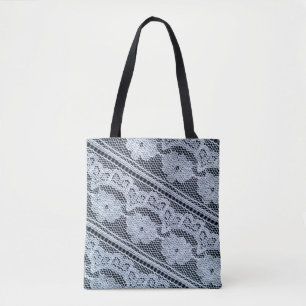 Texture, background, pattern. white lace fabric. T Tote Bag