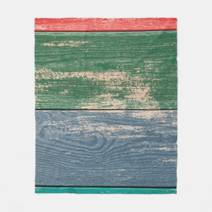 Texture of colour wooden surface as background, to fleece blanket