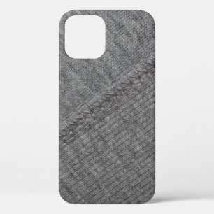 texture of gray fabric with abstract drawings and iPhone 12 case