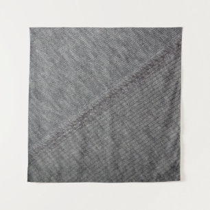 texture of grey fabric with abstract drawings and tapestry