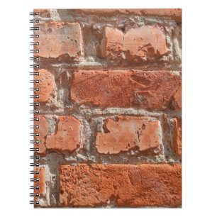 Texture of old weathered brick. Background of old Notebook