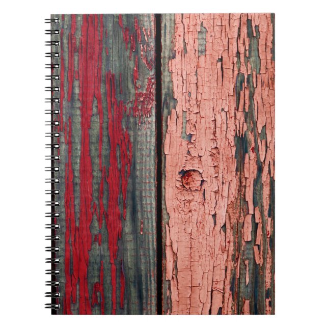 Texture of old wooden fence painted in red and ora notebook (Front)