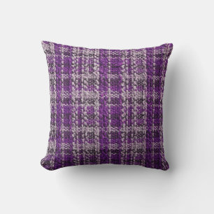 Texture of purple tartan fabric useful as a backgr cushion