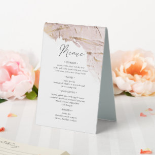 textured rose gold table number and wedding menu