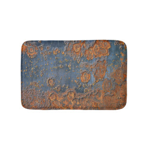 Textured rusted metal background. bath mat