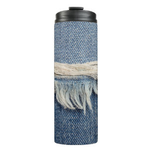 Textures ripped jeans background. thermal tumbler