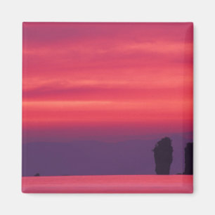 Thailand, Phang Nga Bay. Pink sky reflected in Magnet