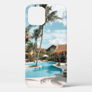 Thatch huts and houses by the pool during day iPhone 12 case